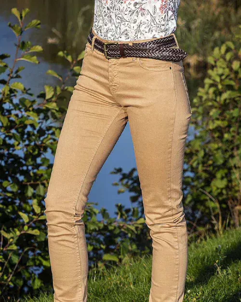 Camel Coloured Baleno Womens Cotton Trousers on pond background 