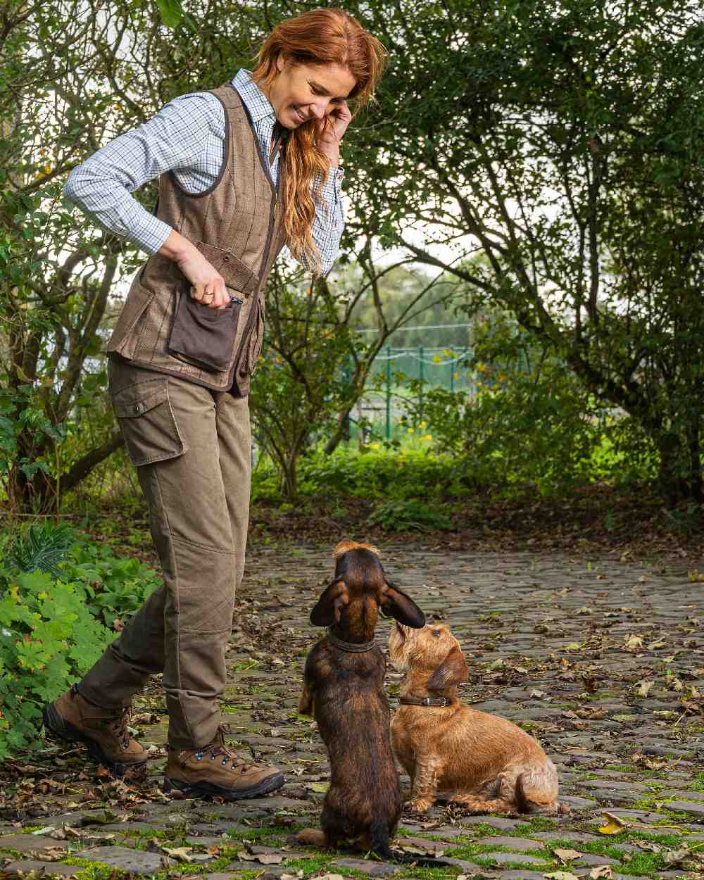 Check Khaki Coloured Baleno Womens Kenwood Shooting Vest on countryside background 