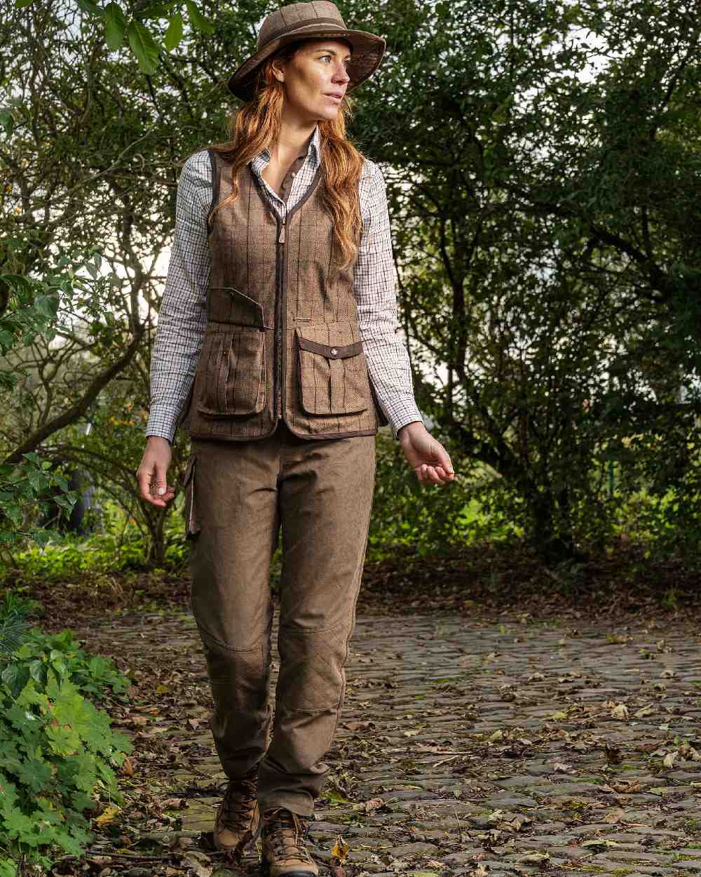 Check Khaki Coloured Baleno Womens Kenwood Shooting Vest on countryside background 