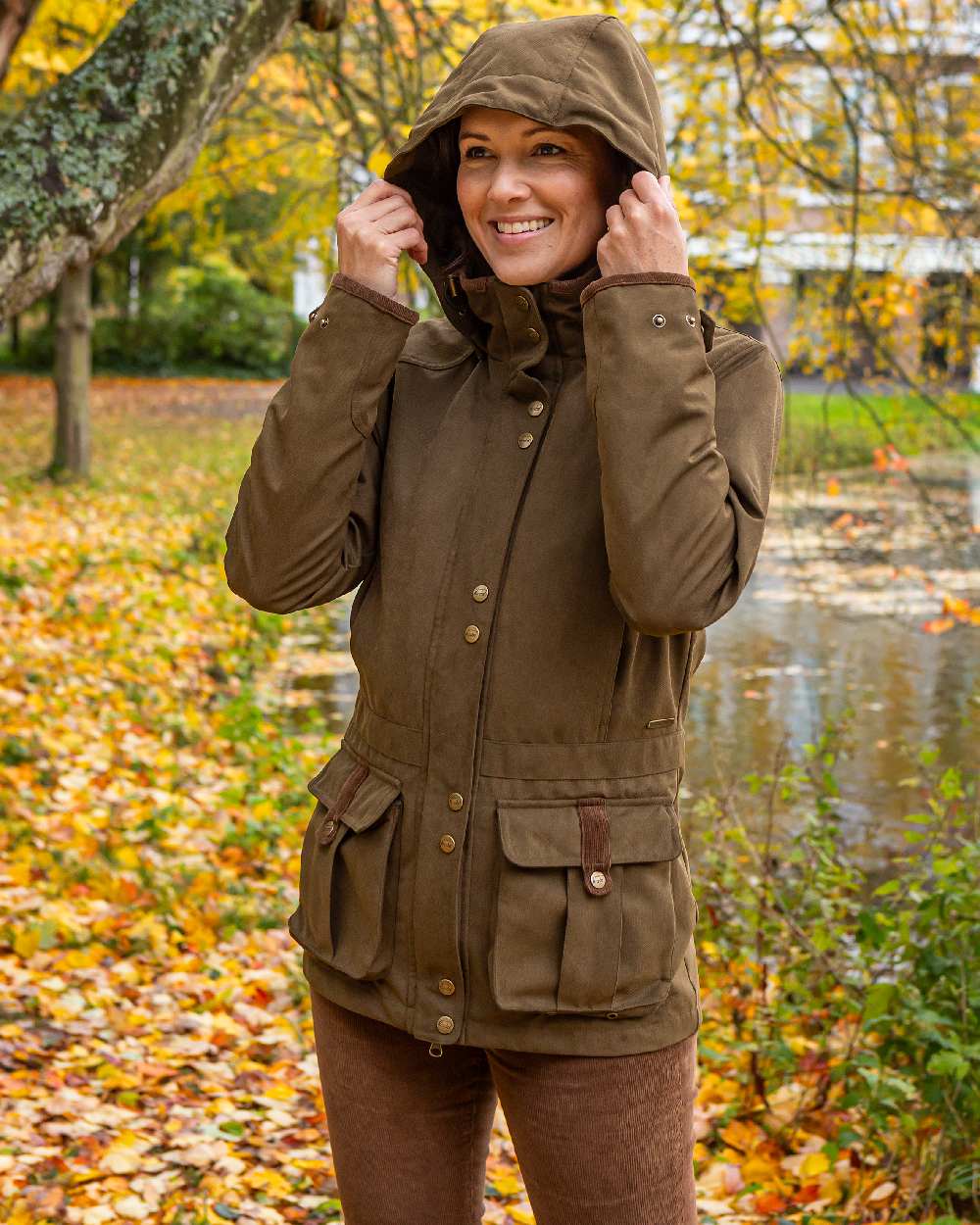 Pine Green Coloured Baleno Womens Ladywood Fashionable Country Jacket on countryside background 