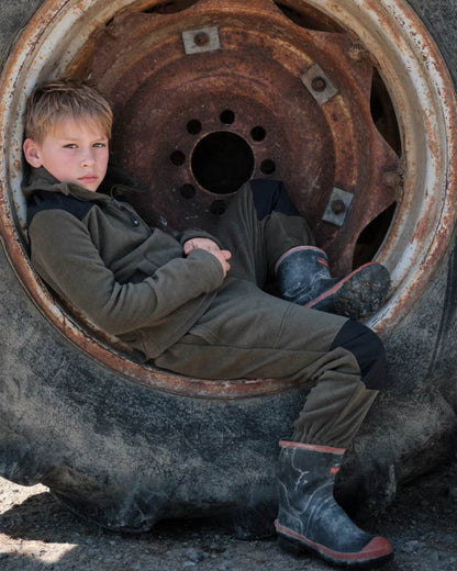 Khaki Black coloured Betacraft Childrens Quest Fleece Bushshirt on tyre background 