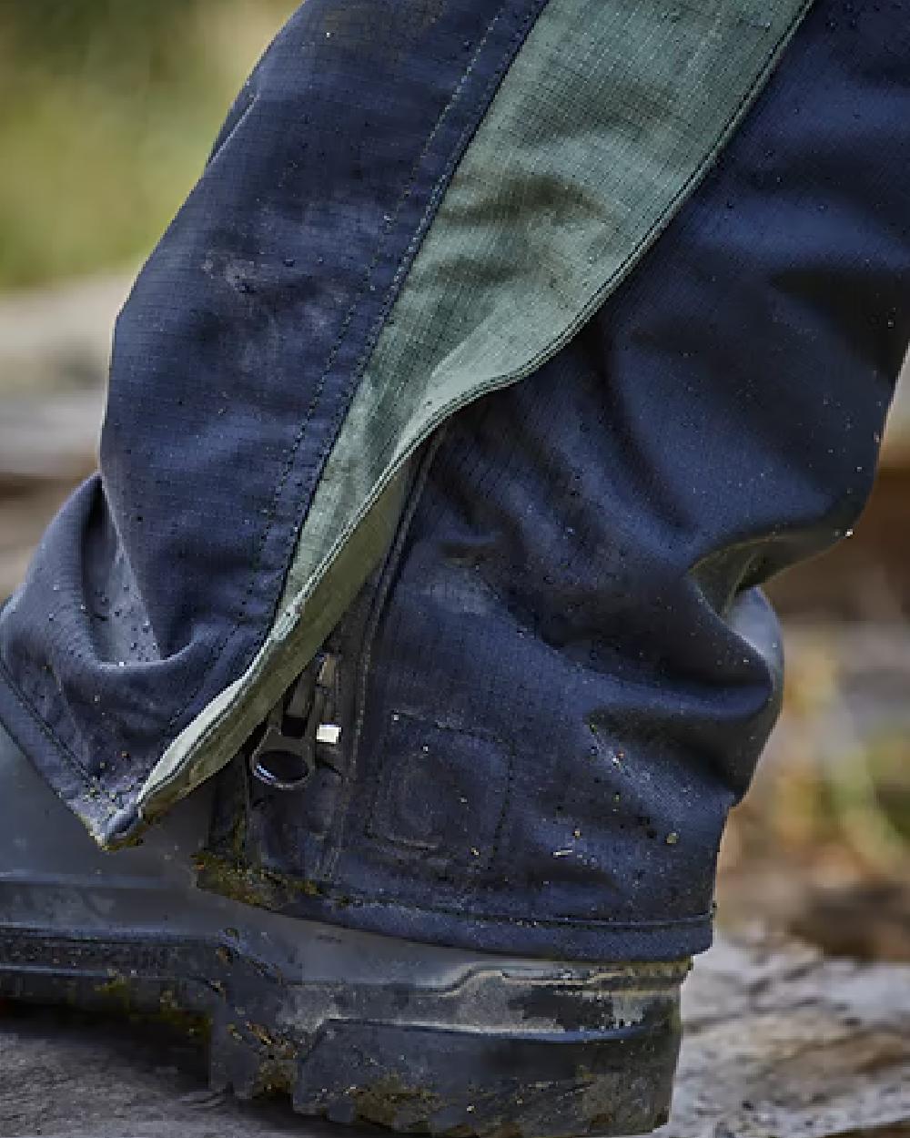 Black Moss coloured Betacraft ISO940 Eco Bib Overtrousers on forest background 