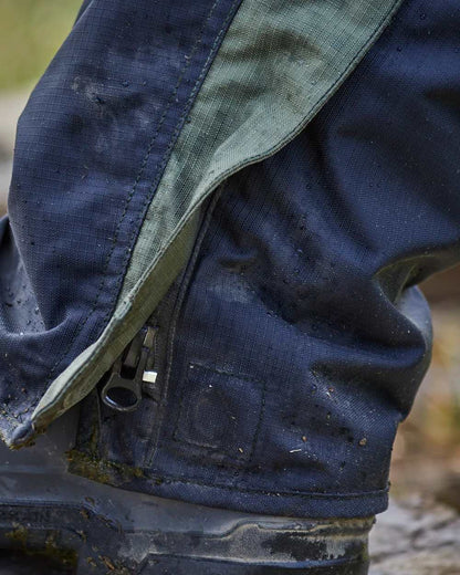 Black Moss Coloured Betacraft ISO940 Eco Over Trouser on forest background 