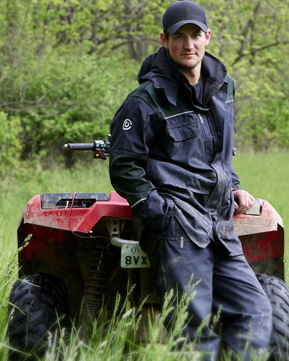 Black Moss Coloured Betacraft ISO940 Eco Over Trouser on forest background 