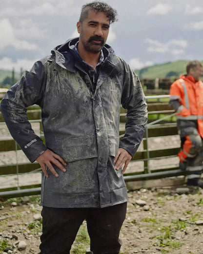 Navy coloured Betacraft Mens Techniflex Parka on farm background 