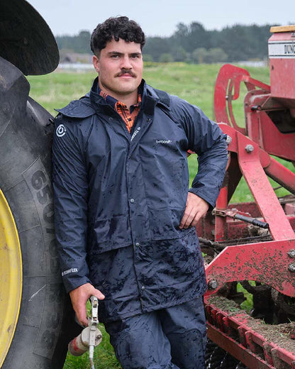 Navy coloured Betacraft Mens Techniflex Parka on farm background 