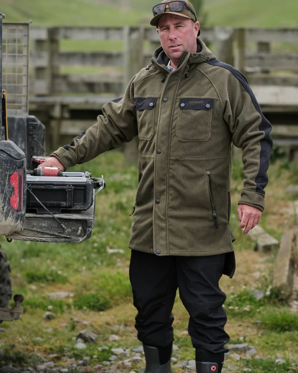 Dark Khaki coloured Betacraft Mens Zephyr Fleece Jacket on outdoor background 