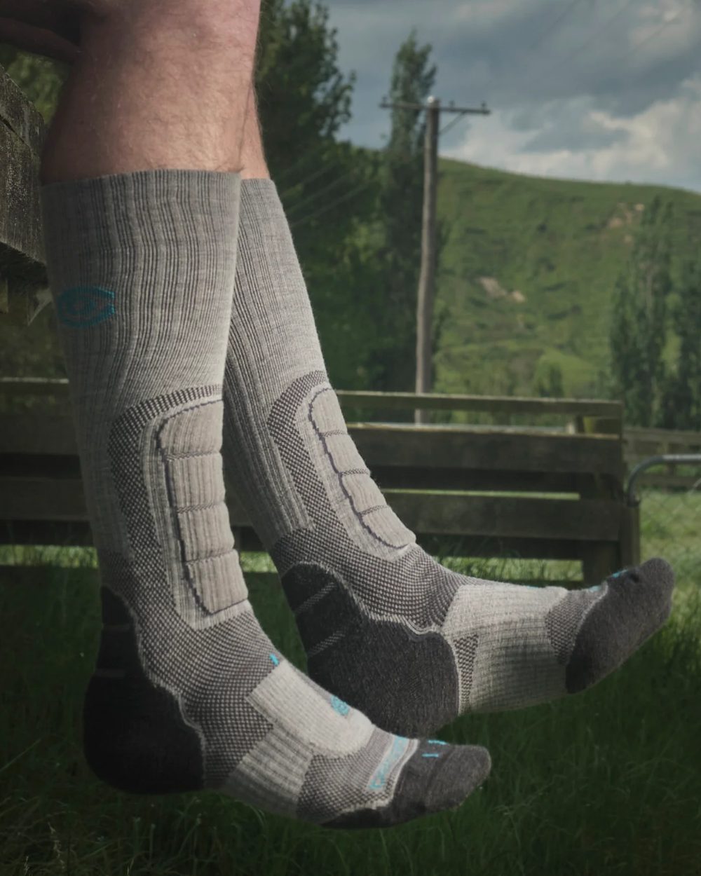 Grey coloured Betacraft Merino Ergo Boot Socks on farm background 