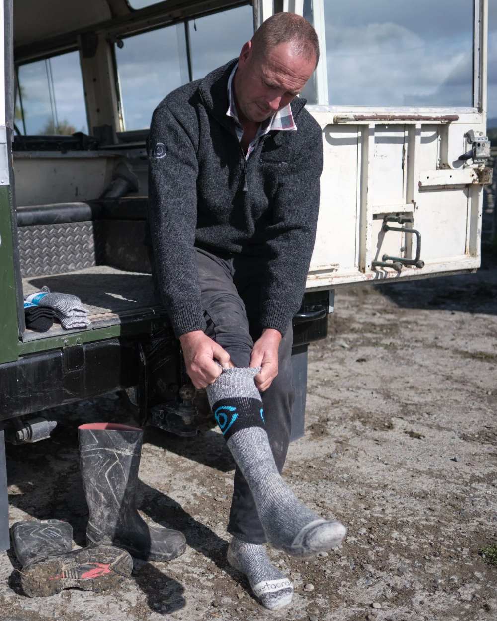 Grey coloured Betacraft Merino Full Length Socks on jeep background 