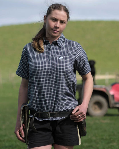 Dark Navy Cool Blue coloured Betacraft Station Shorts 3 on farm background 