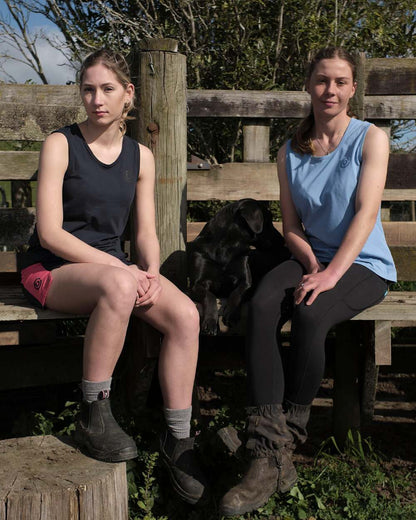 Dark Navy Hot Pink coloured Betacraft Station Shorts 3 on farm background 