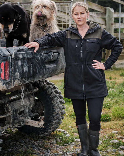 Black coloured Betacraft Womens Zephyr Fleece Jacket on outdoor background 