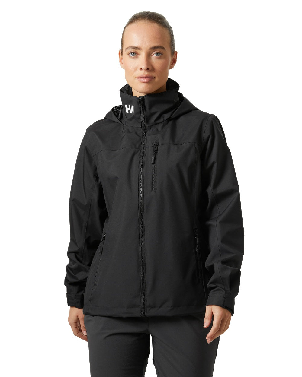 Black coloured Helly Hansen womens crew hooded sailing jacket 2.0 on white background 