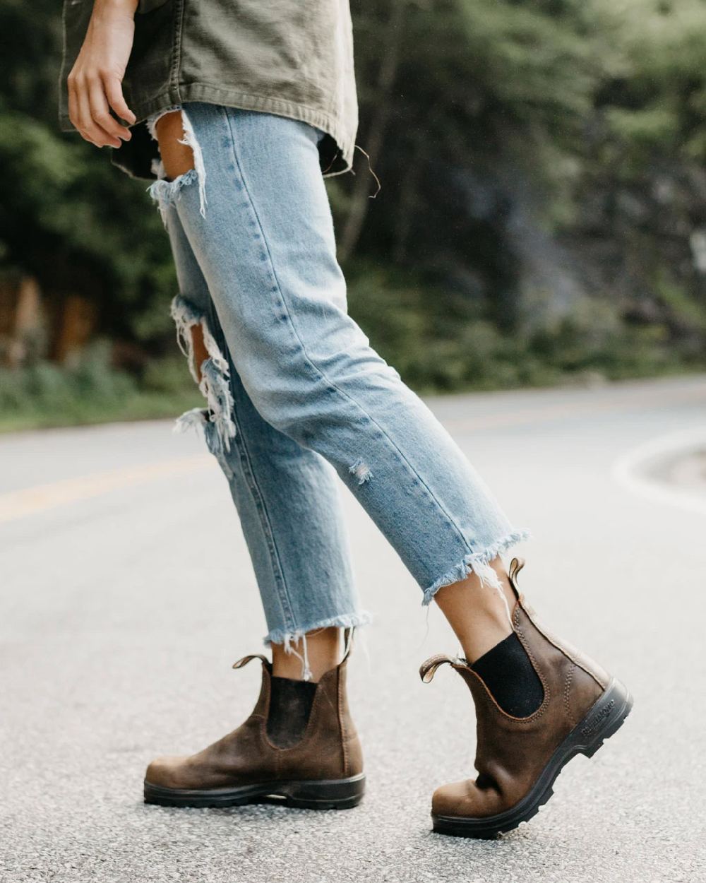 Antique brown coloured Blundstone 1609 Antique Brown Boots on street background 