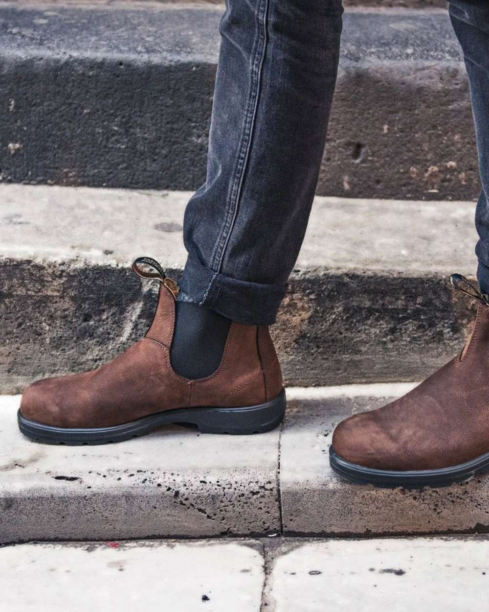 Antique brown coloured Blundstone 1609 Antique Brown Boots on stairs background 