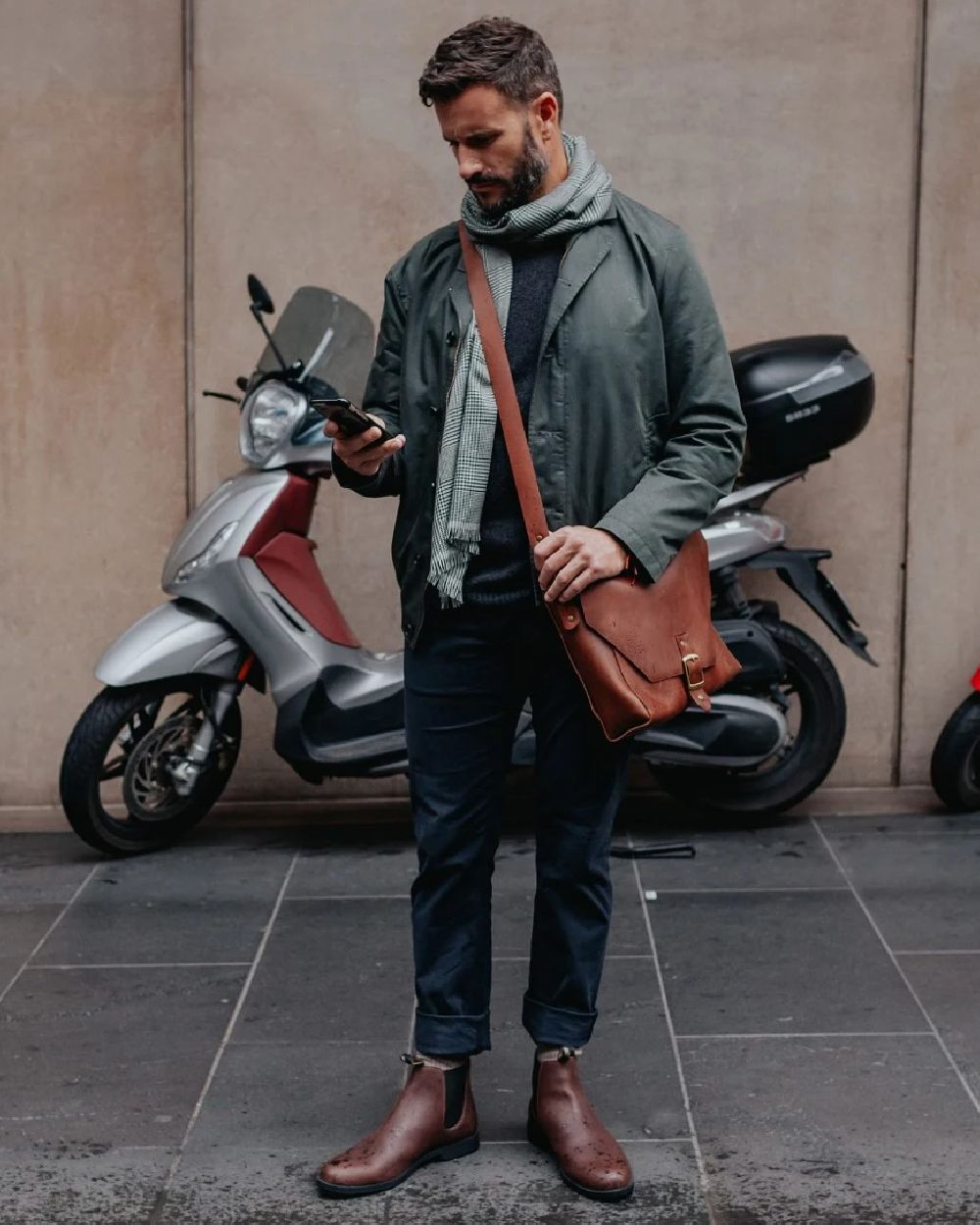 Chestnut Brown coloured Blundstone 1900 Chestnut Brown Dress Boots on street background 