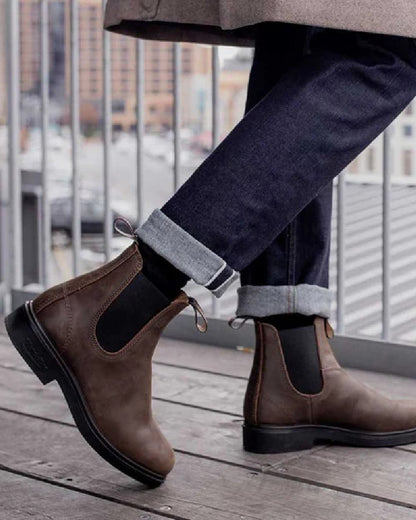 Antique Brown coloured Blundstone 2029 Brown Leather Chelsea Boots on balcony background 