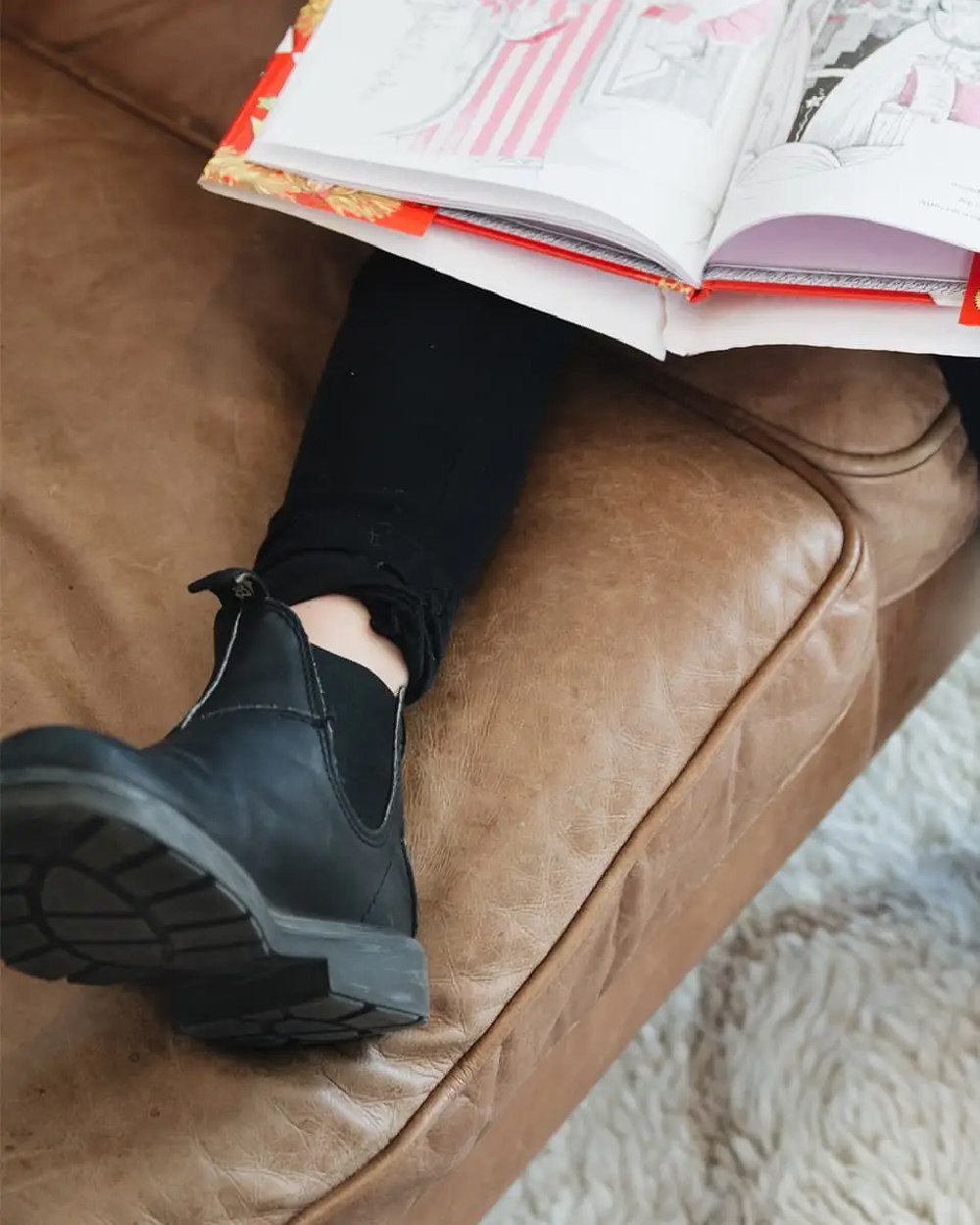 Black Coloured Blundstone Childrens 531 Black Leather Boots on indoor background 