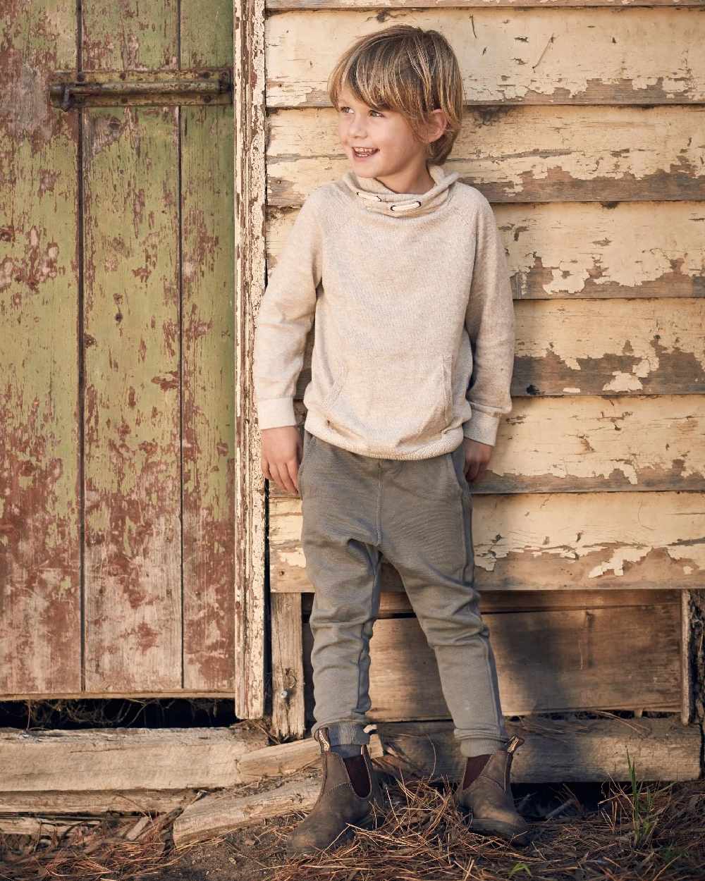 Rustic Brown Coloured Blundstone Childrens 565 Rustic Brown Leather Boots on outdoor background 