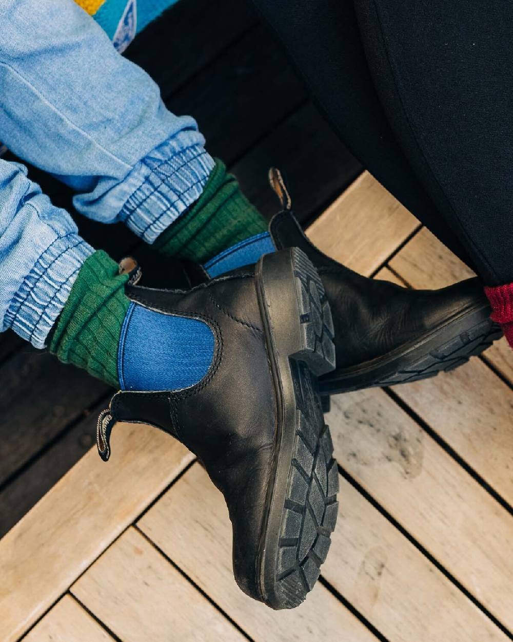 Black Blue Coloured Blundstone Childrens 580 Black Blue Chelsea Boots on indoor background 