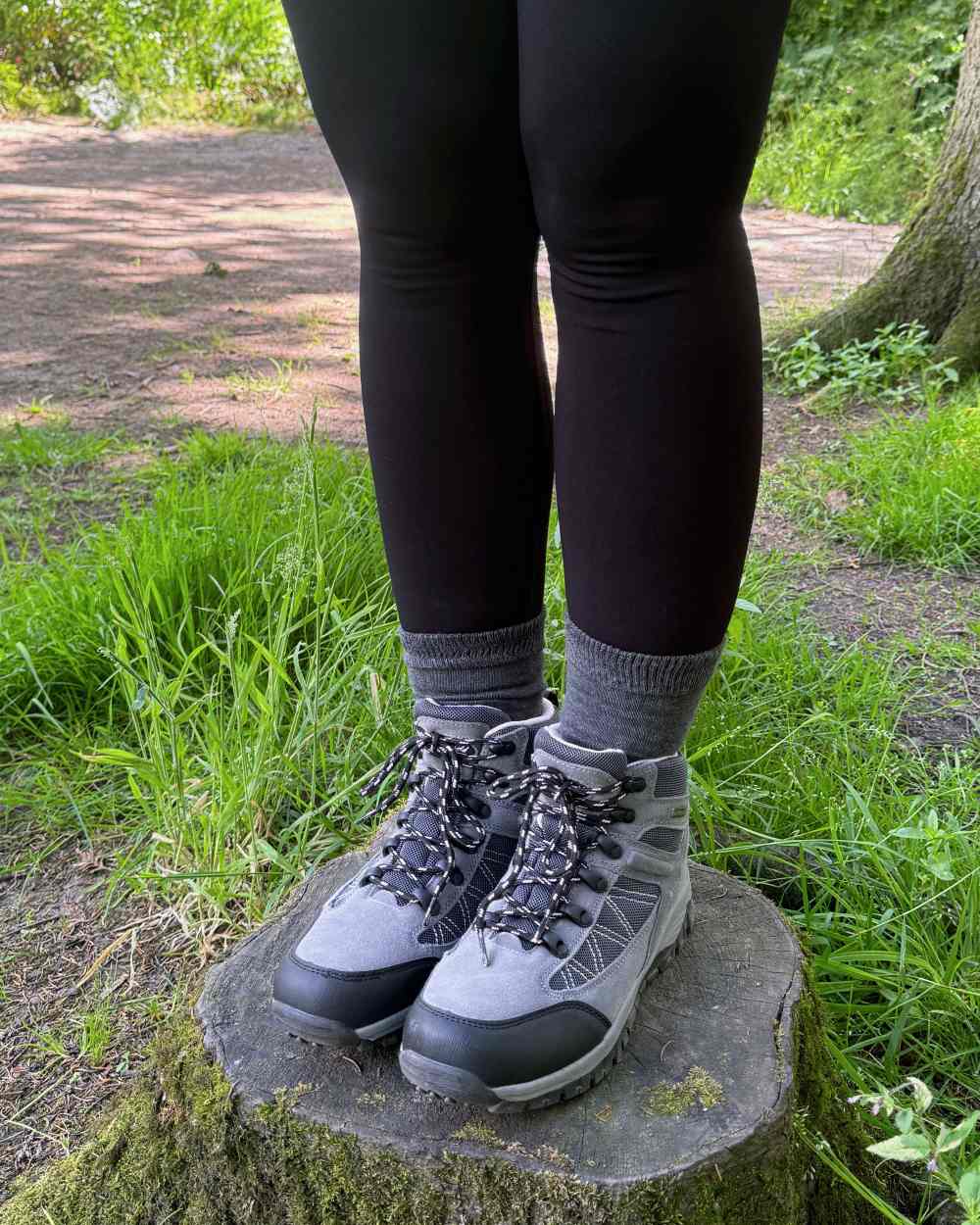 Grey Black coloured Bramble Womens Hiker Bamboo Footbed Socks Triple Pack on park backgound 
