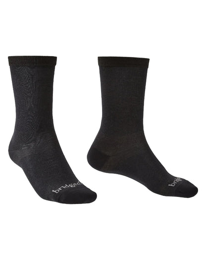 Black coloured Bridgedale Base Layer Coolmax Socks on white background 