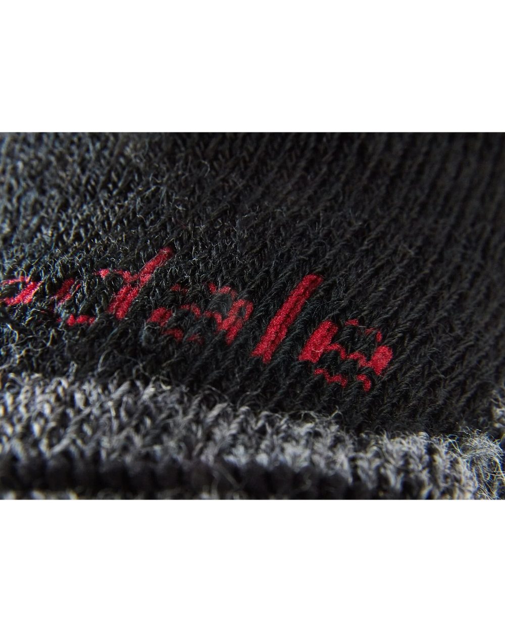 Black coloured Bridgedale Heavyweight Merino Performance Knee Socks on white background 