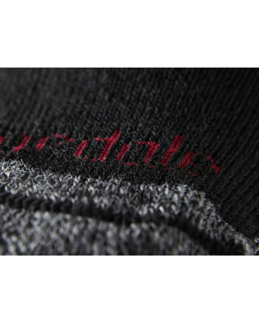 Close up of Black coloured Bridgedale Heavyweight Merino Performance Socks on a white background 