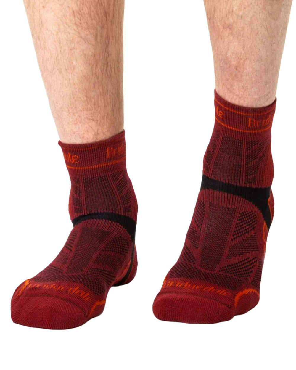 Red coloured Bridgedale Mens Lightweight T2 Merino Sport 3/4 Crew Socks on white background
