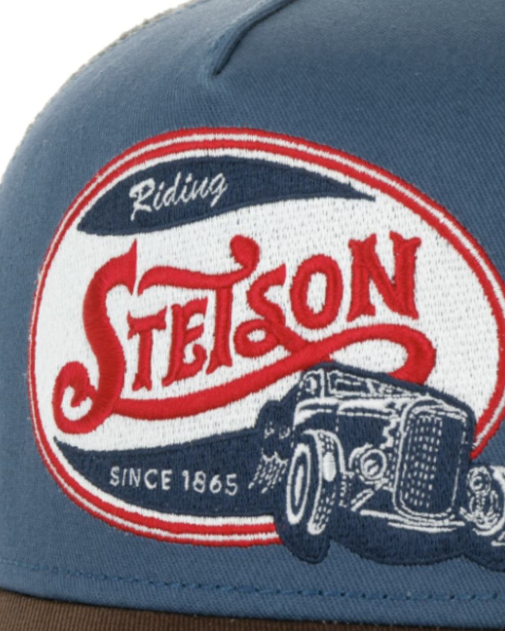 Brown/Denim coloured Stetson Riding Hot Rod Trucker Cap on White background 