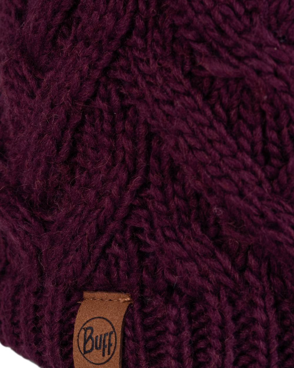 Dahlia Coloured Buff Caryn Knitted Fleece Beanie on white background 