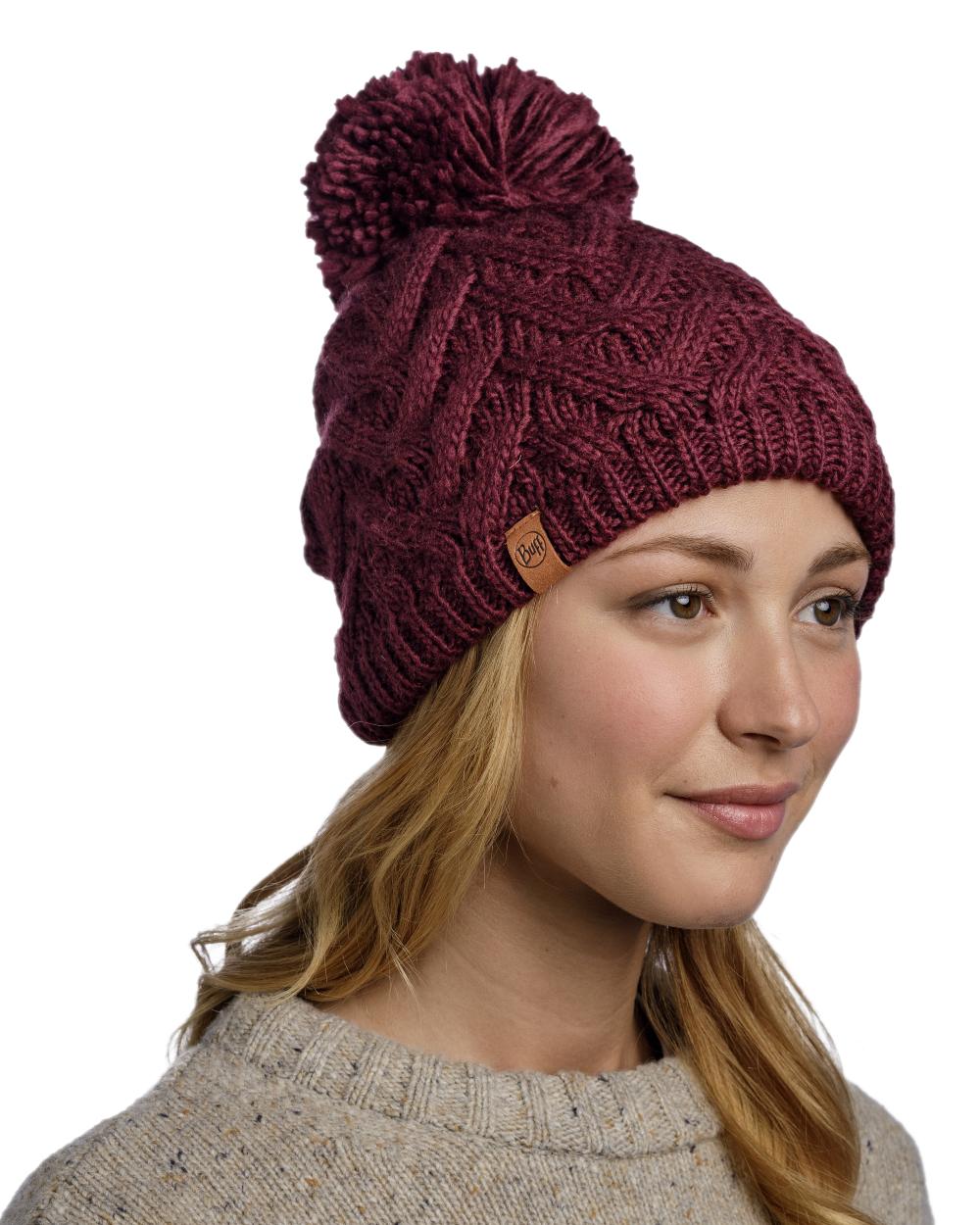 Dahlia Coloured Buff Caryn Knitted Fleece Beanie on white background 