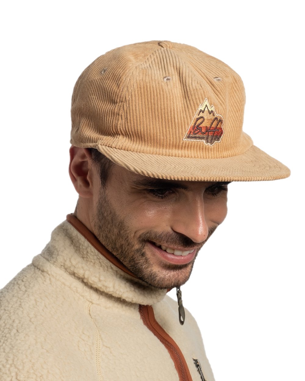 Peanut Coloured Buff Dister Chill Trucker Cap on white background 