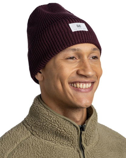 Burgundy Coloured Buff Drisk Knitted Beanie on white background 