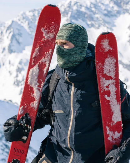 Jade Coloured Buff Dryflx Pro Solid Balaclava on snow background 