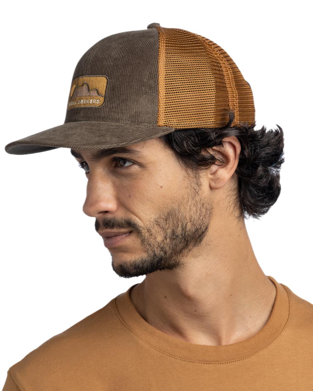 Brown Coloured Buff Explore Trucker Cap on white background 