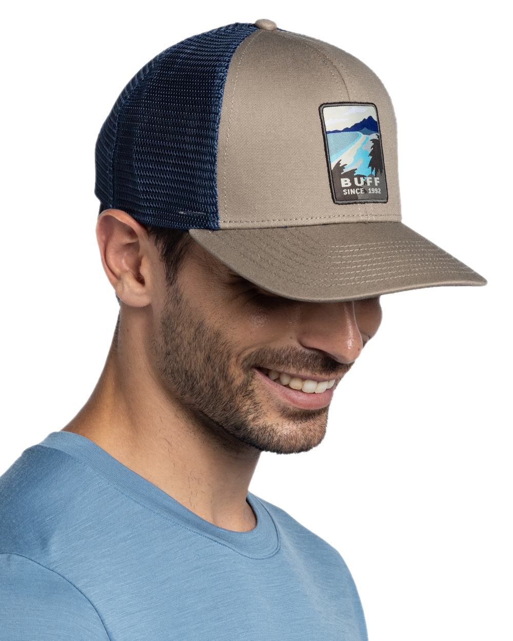 Tundra Khaki Coloured Buff Explore Trucker Cap on white background 