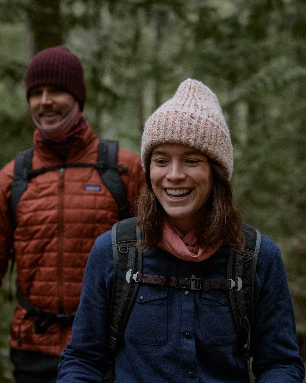 White Coloured Buff Kim Knitted Fleece Beanie on forest background 