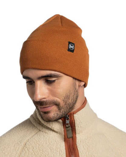 Copper Coloured Buff Linon Knitted Beanie on white background 