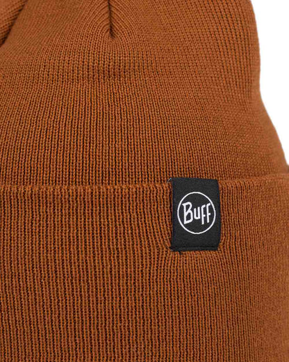 Copper Coloured Buff Linon Knitted Beanie on white background 