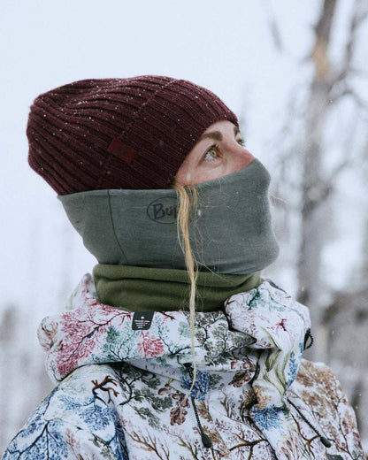 Maroon Coloured Buff Knitted Norval Beanie on snow background 