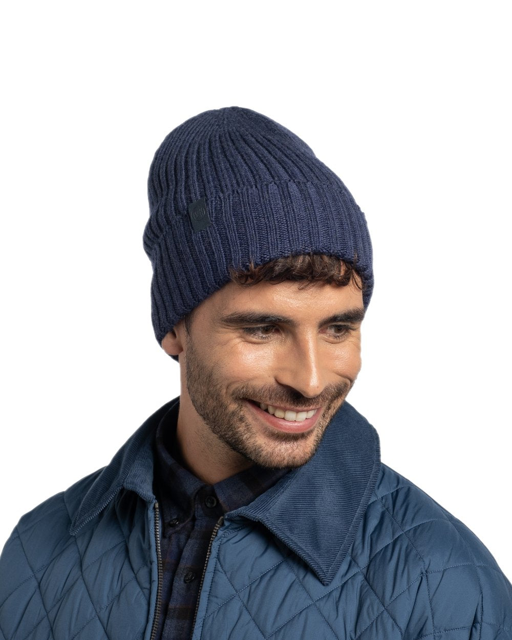 Midnight Coloured Buff Knitted Norval Beanie on white background 