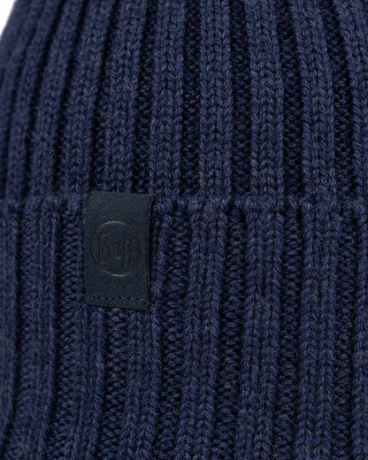 Midnight Coloured Buff Knitted Norval Beanie on white background 