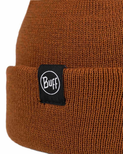 Copper Coloured Buff Lilon Fisherman Knitted Beanie on white background 