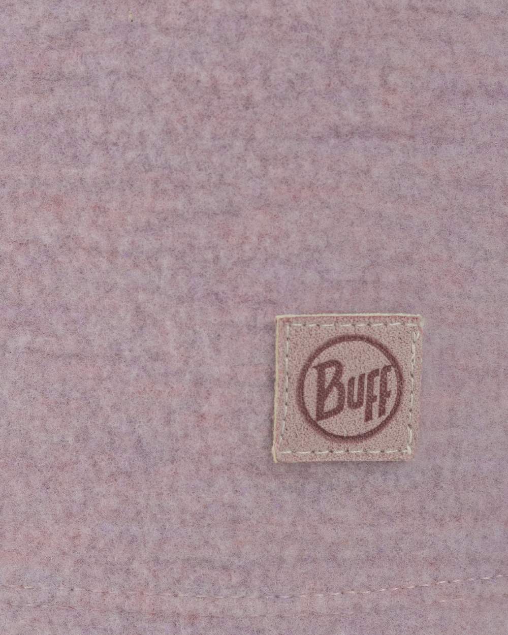 Lilac Sand Coloured Buff Merino Fleece Beanie on white background 