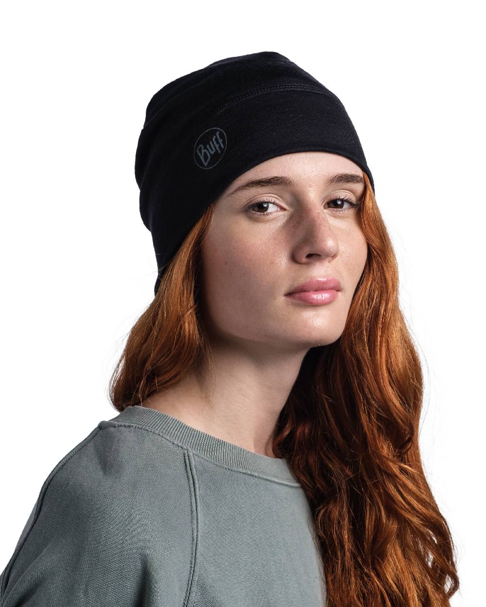 Black Coloured Buff Merino Lightweight Beanie on white background 