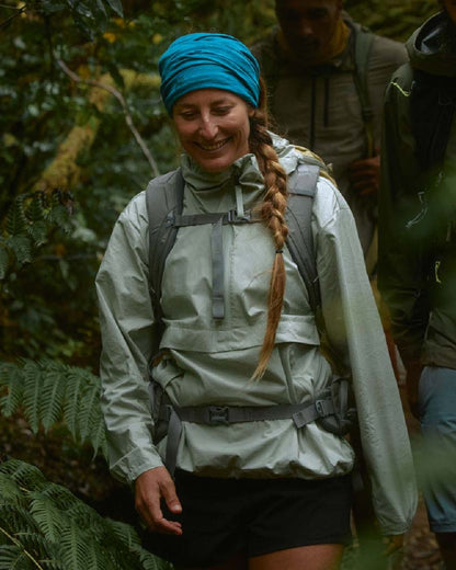 Teal Coloured Buff Merino Lightweight Neck Warmer on outdoor background 