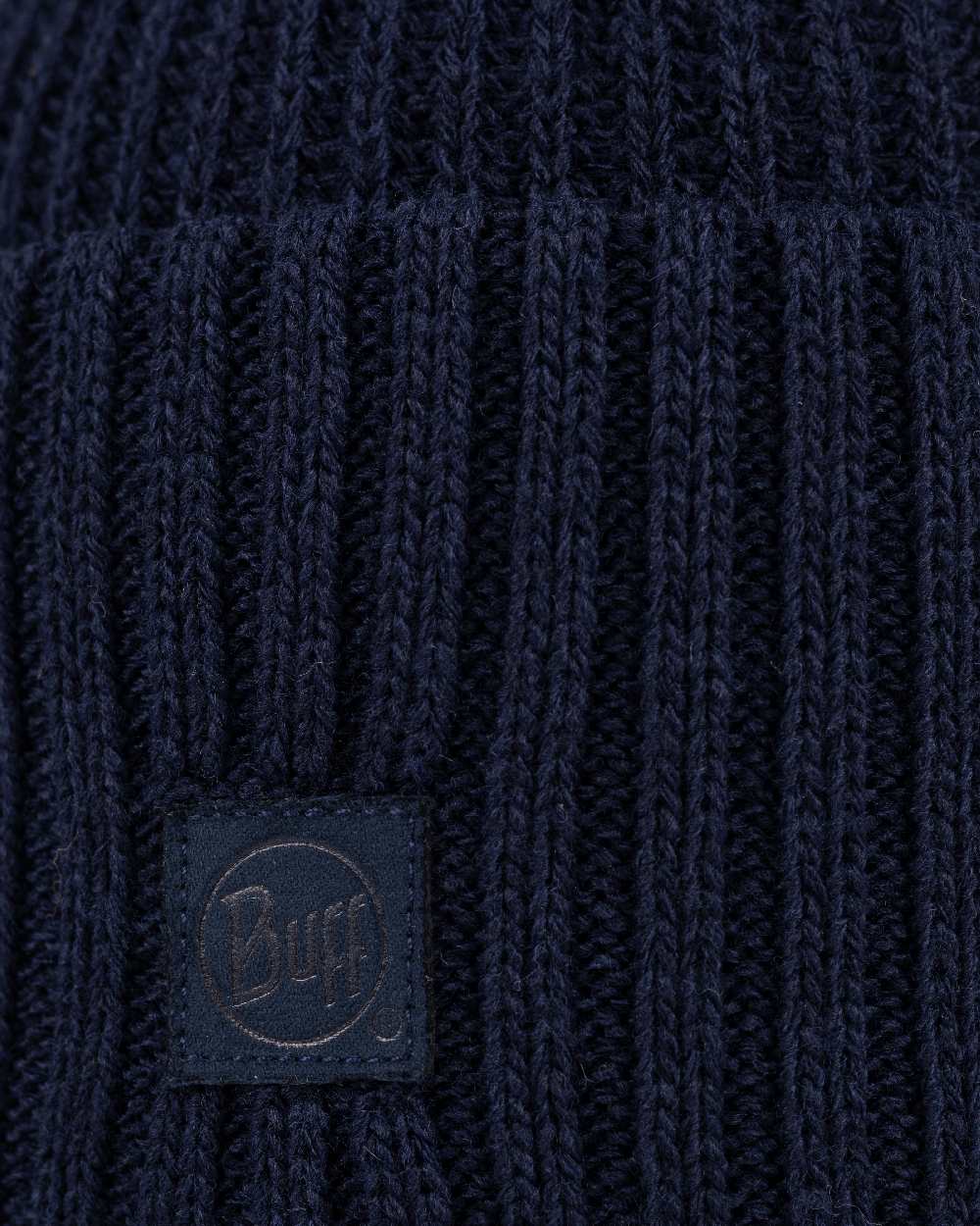 Midnight Coloured Buff Rutger Knitted Beanie on white background 