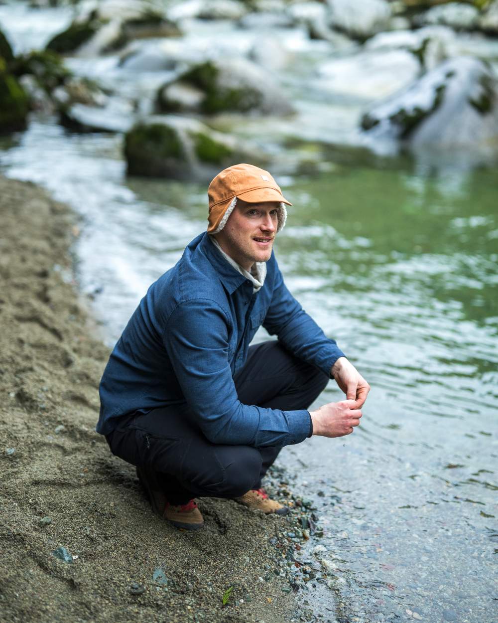 Copper Coloured Buff Simu Fall Line Cap on lake background 