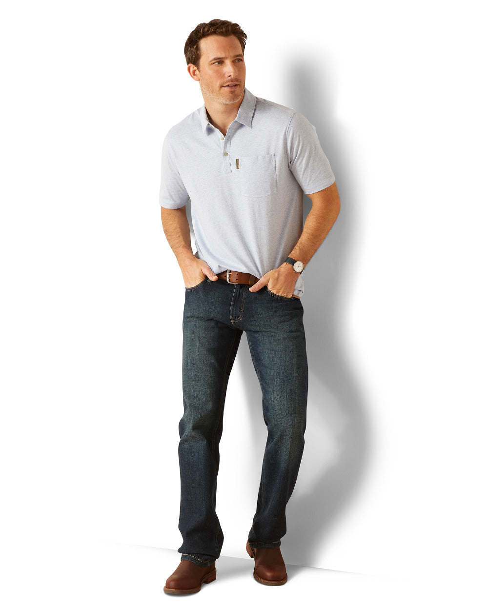 Chambray Blue Coloured Ariat Mens Chorley Polo Shirt On A White Background 